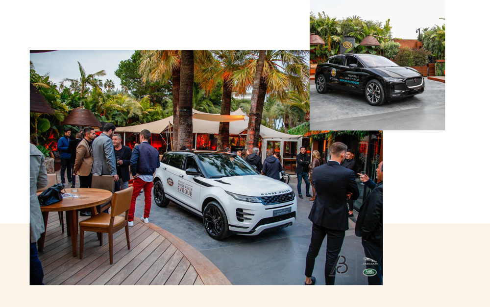 évènement privé pour land rover jaguar au bâoli cannes avec des voitures et des clients qui discutent